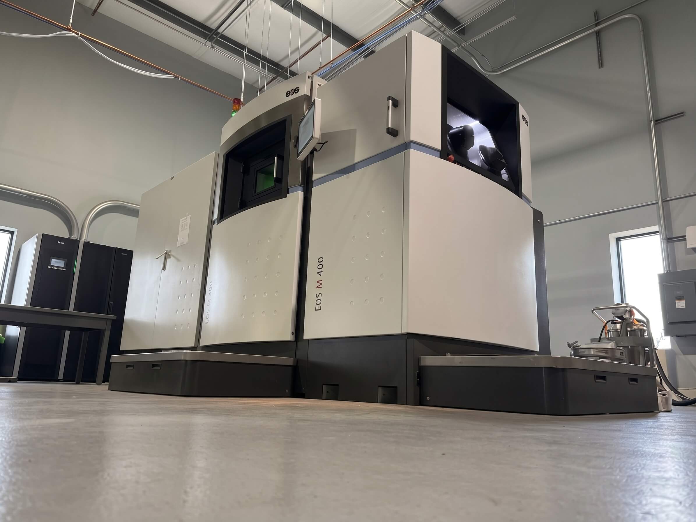 EOS M 400 laser powder bed fusion machine on the AME shop floor