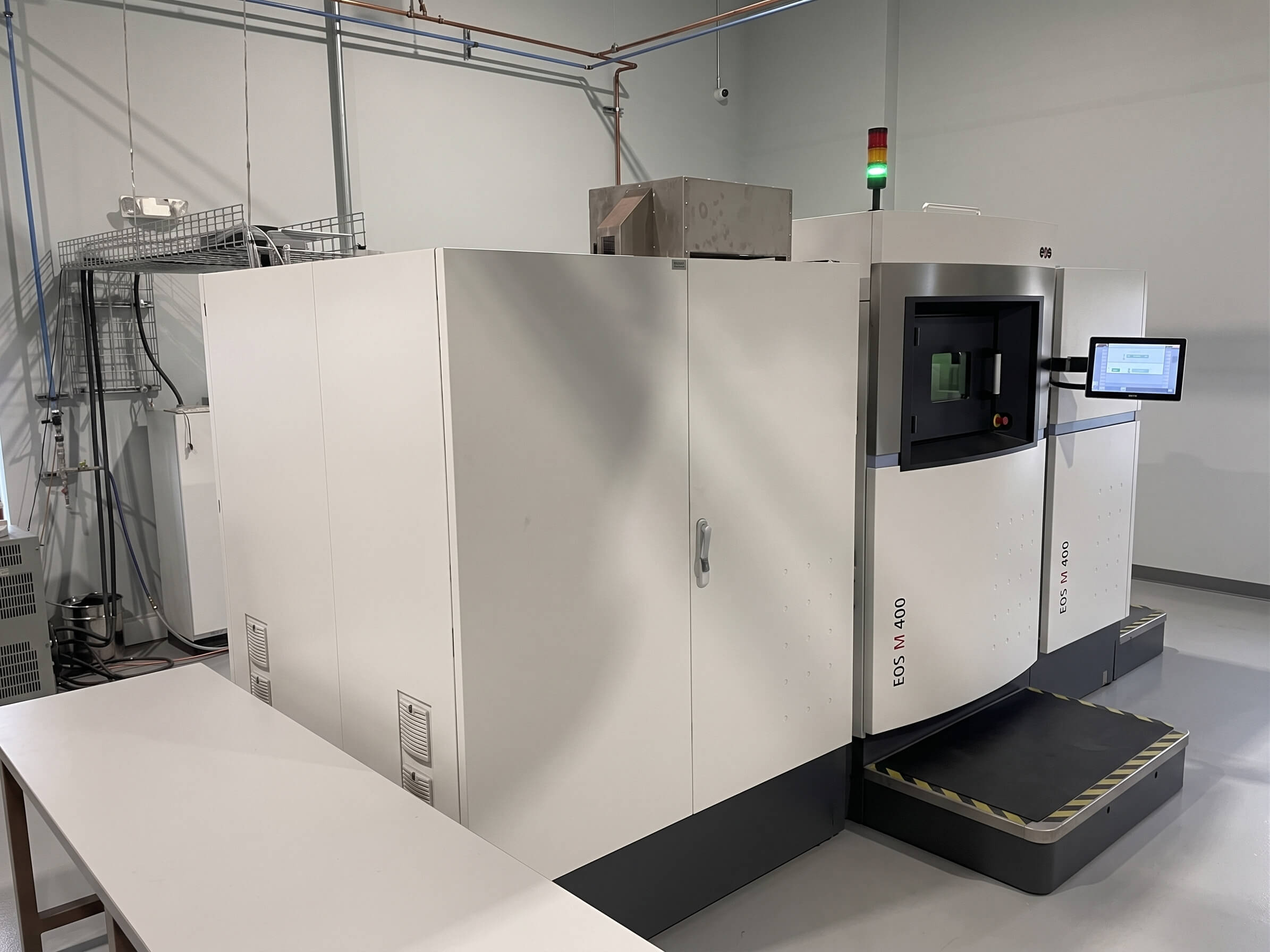 EOS M 400 laser powder bed fusion machine on the AME shop floor